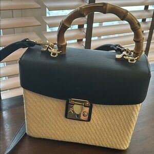 Elegant Black and Tan Handbag with Bamboo Handle